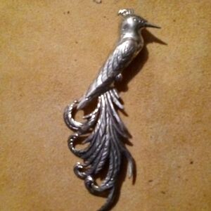 Sterling silver bird of paradise. Sterling brand designs